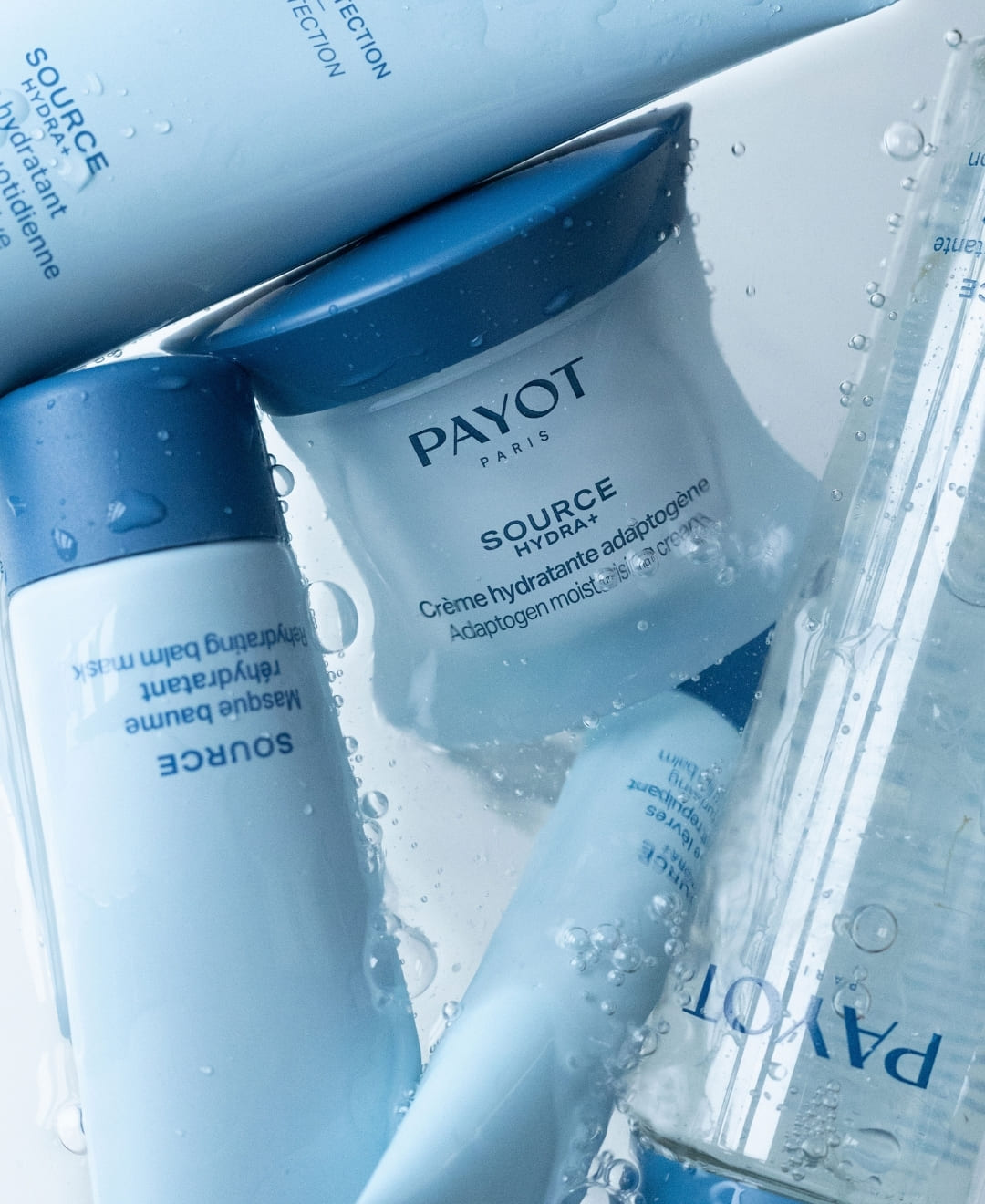 Produits hydratants Source Hydra+ PAYOT pour le visage et les lèvres – disponibles chez Concept Beauté.